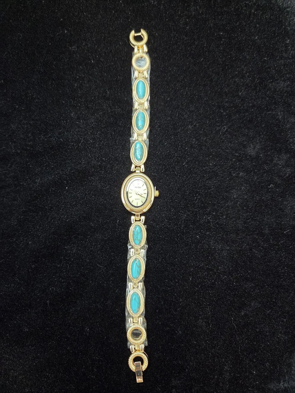 Gold Tone Bracelet Watch with Turquoise Inlay